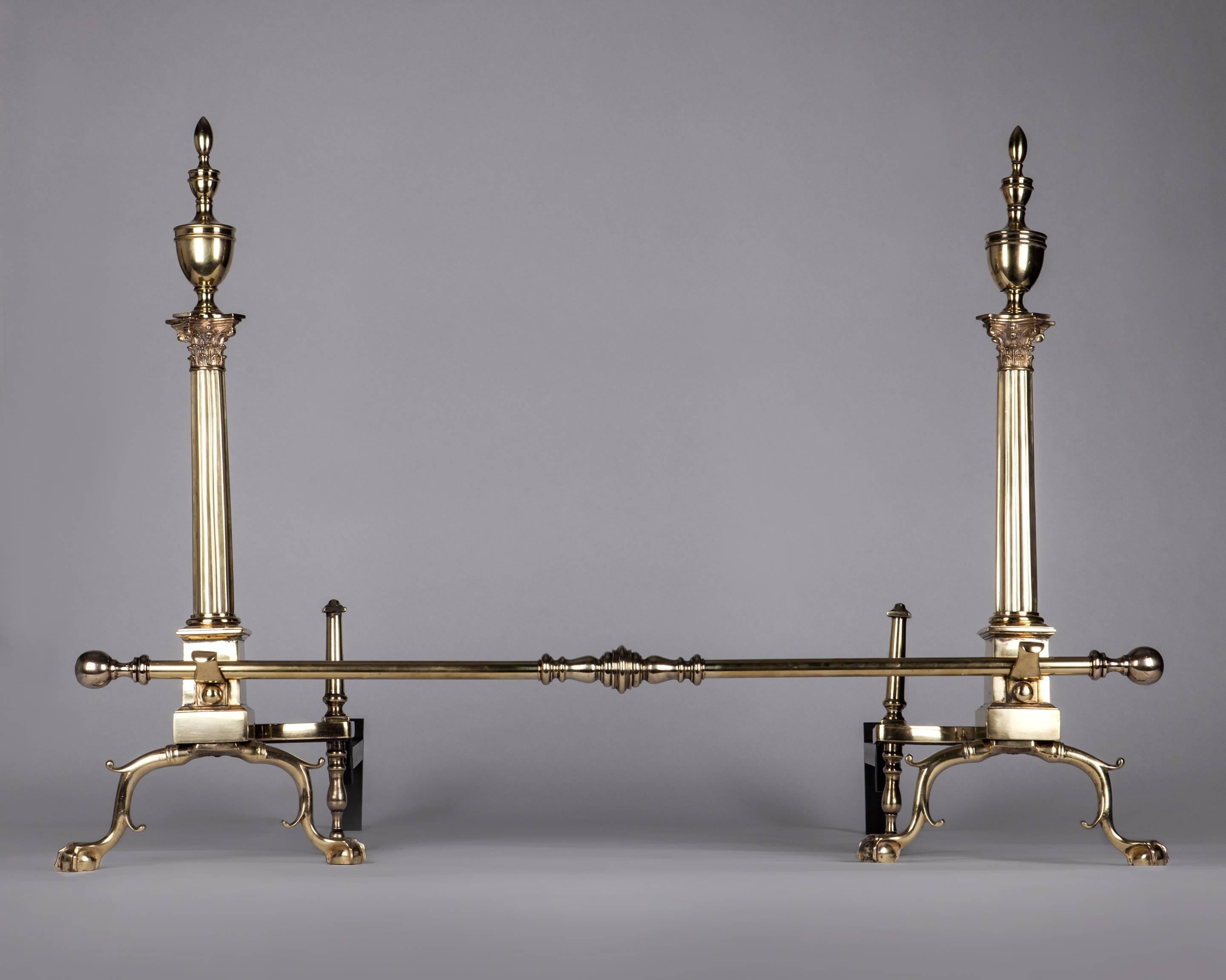 Neoclassical Brass Andirons with Fluted Corinthian Columns and Urn Form Finials, Circa 1920s For Sale