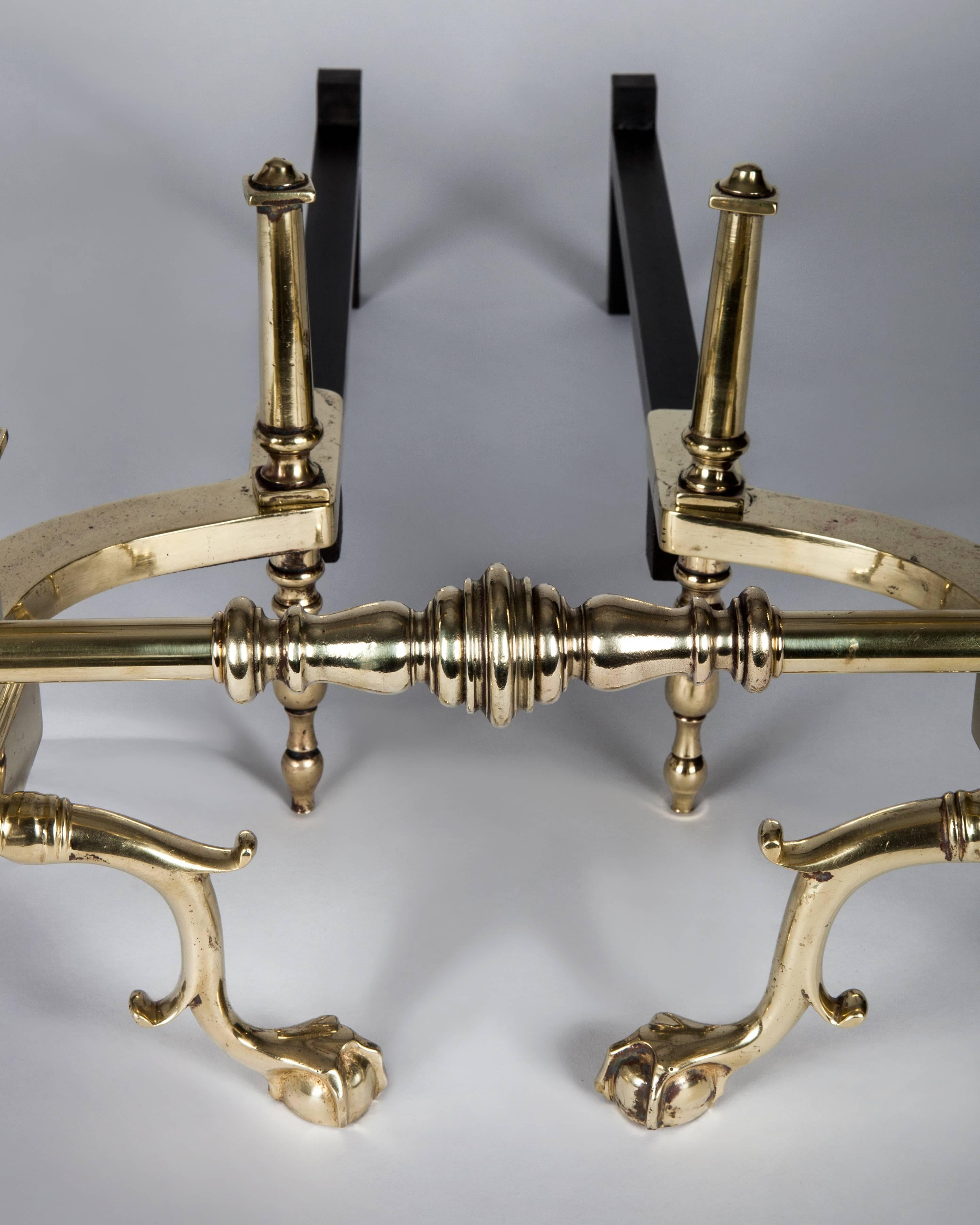 American Brass Andirons with Fluted Corinthian Columns and Urn Form Finials, Circa 1920s For Sale