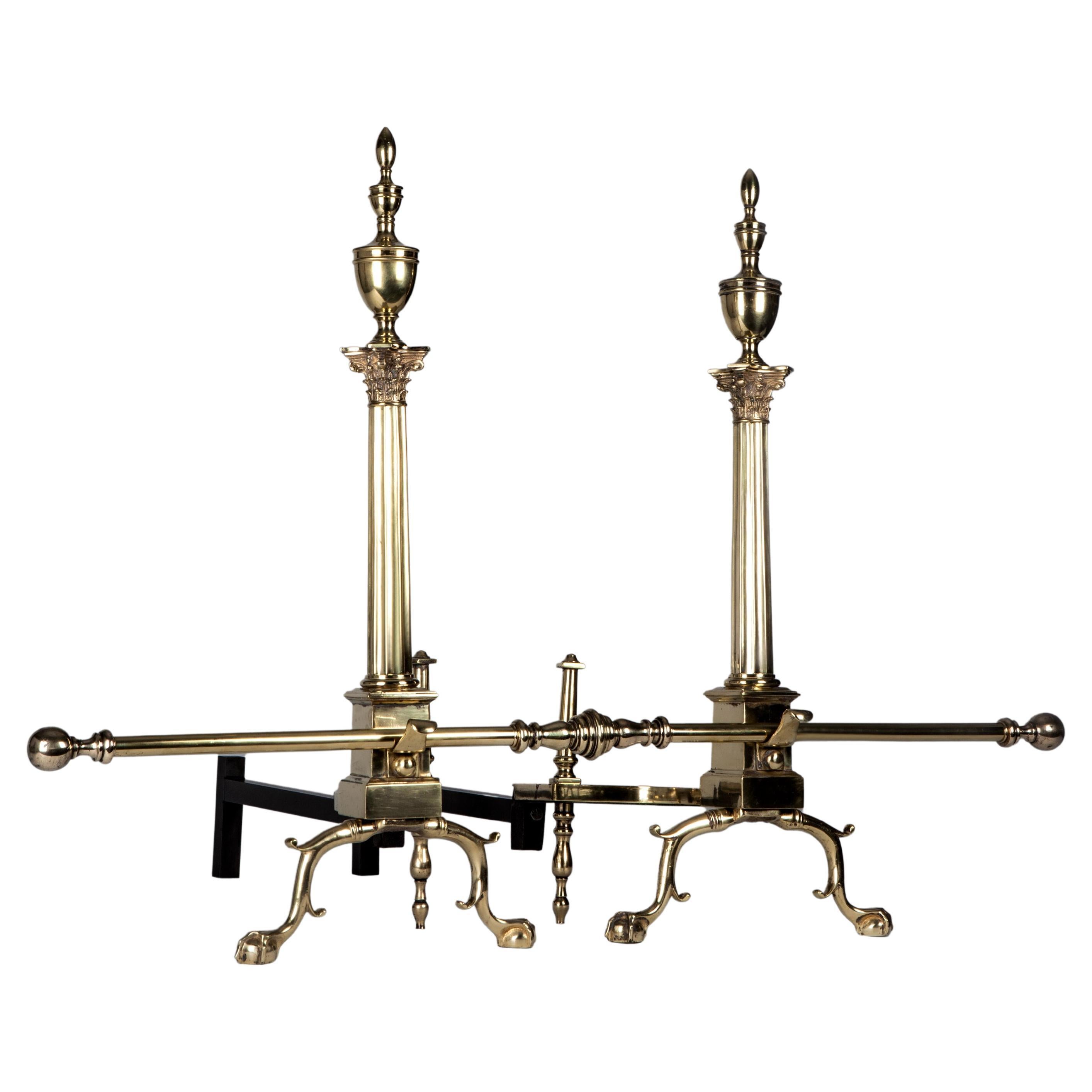 Brass Andirons with Fluted Corinthian Columns and Urn Form Finials, Circa 1920s For Sale