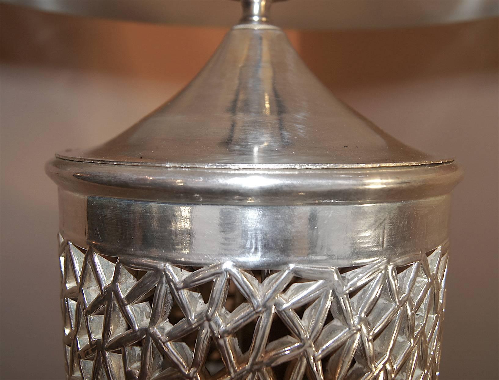 pair of silver lamps