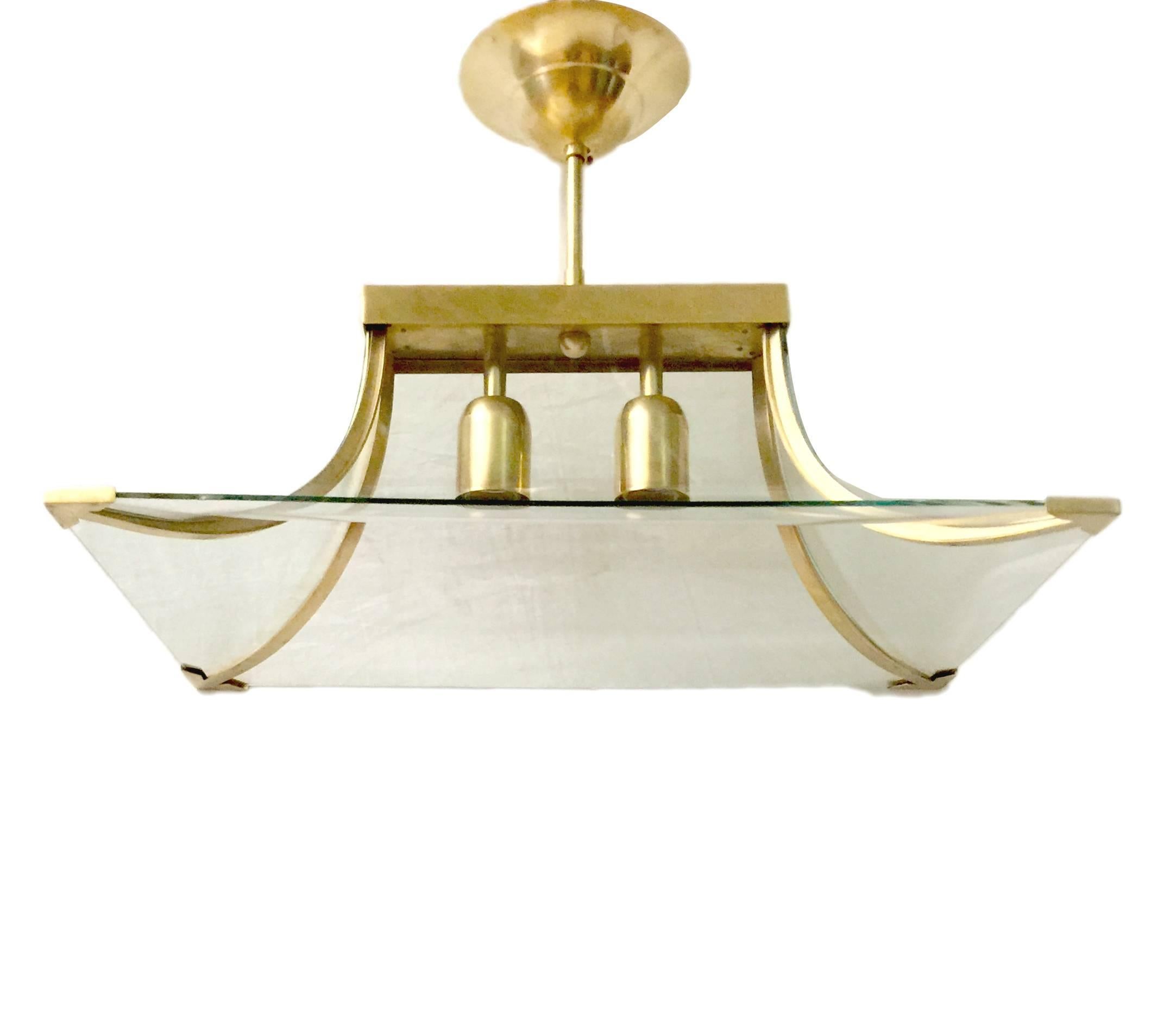Circa 1960's Italian stylised pagoda-shaped Italian glass and brass pendant light fixture with two interior lights. 

Measurements:
Height: 13