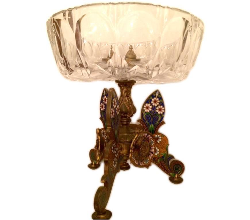 French églomisé bronze and crystal with foliage and floral motif on gilt bronze base.
Measures: 9