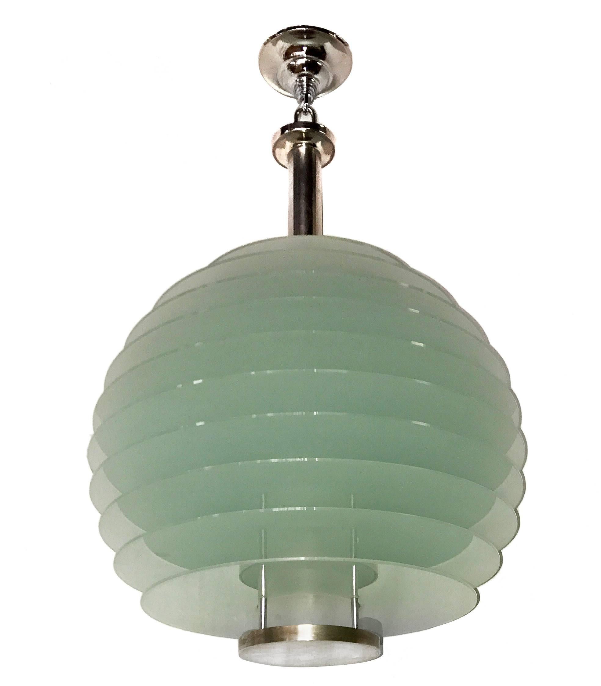 A circa 1960's Italian frosted glass globe shaped light fixture with three interior lights.

Measurements:
Diameter: 24