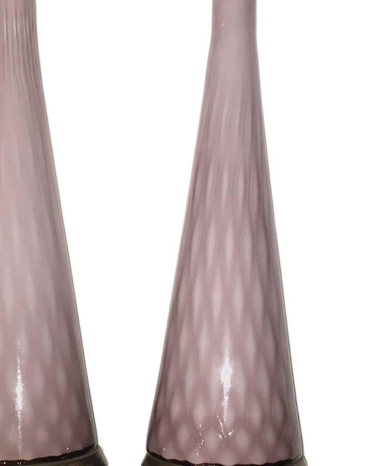Pair of 1950s molded blown glass Murano lamps, two tones of lavender glass.

Measurements:
17.5