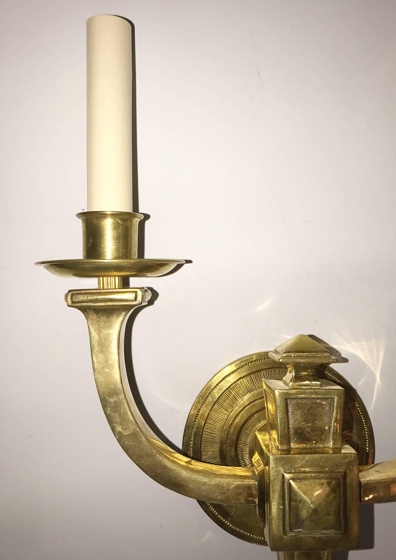 Set of ten American, 1930s neoclassic sconces with two lights.
Sold in pairs

Measurements:
14