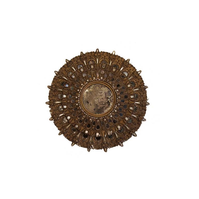 Espejo Sunburst de madera dorada tallada