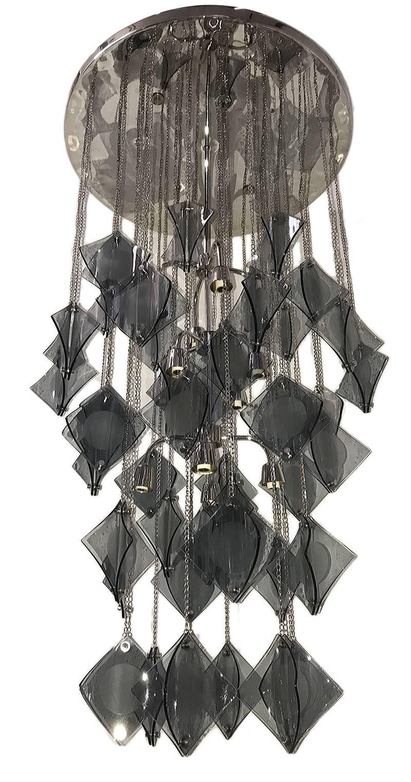 A large Italian molded glass light fixture with 12 candelabra lights, circa 1960s.

Measurements:
Height 51.5