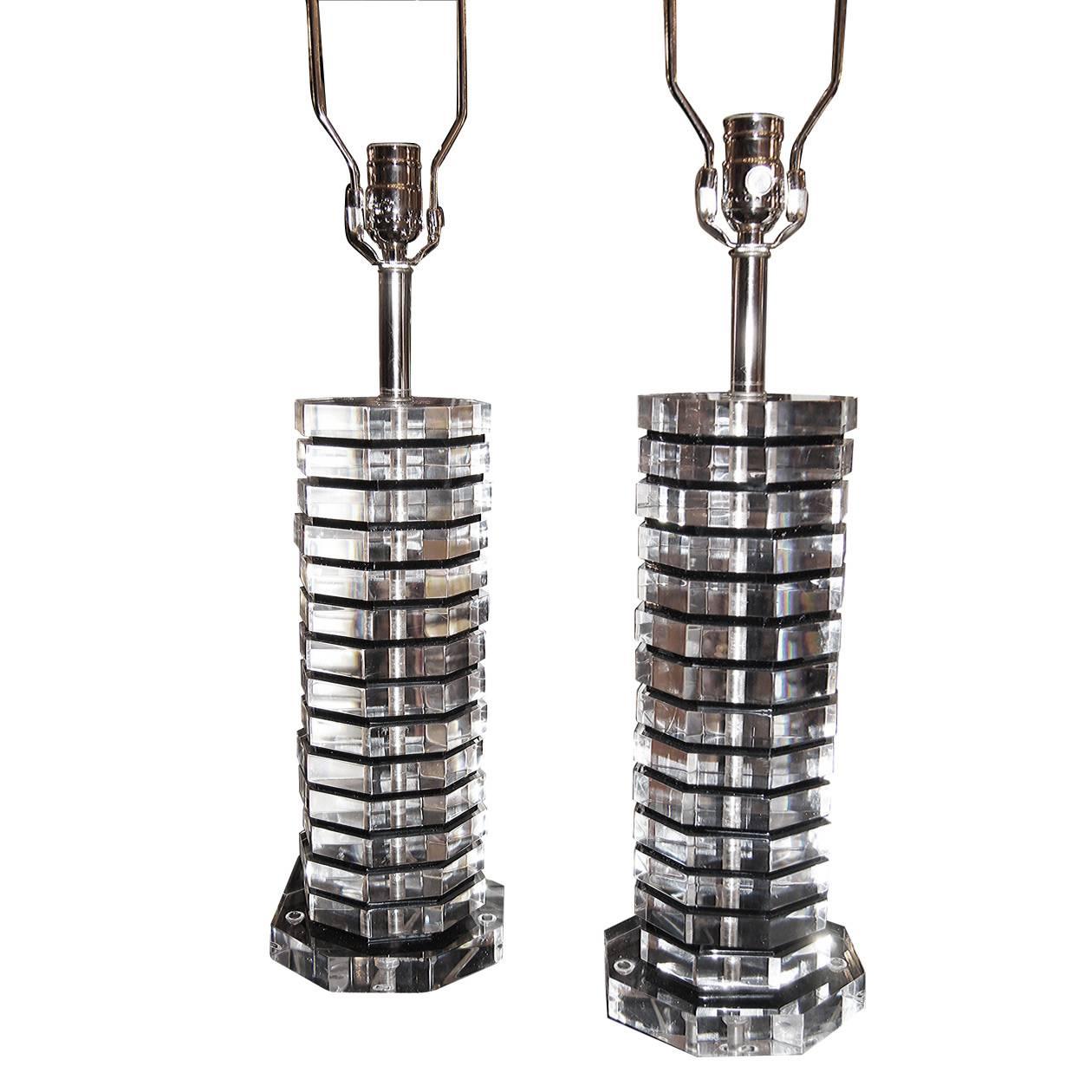 Pair of circa 1960s French Lucite lamps, black and clear Lucite bodies.

Measurements:
18