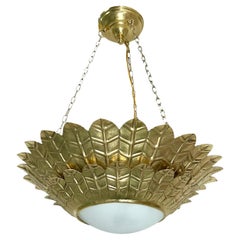 Set of Gilt Sunburst Double-Tiered Light Fixtures. Sold Individually