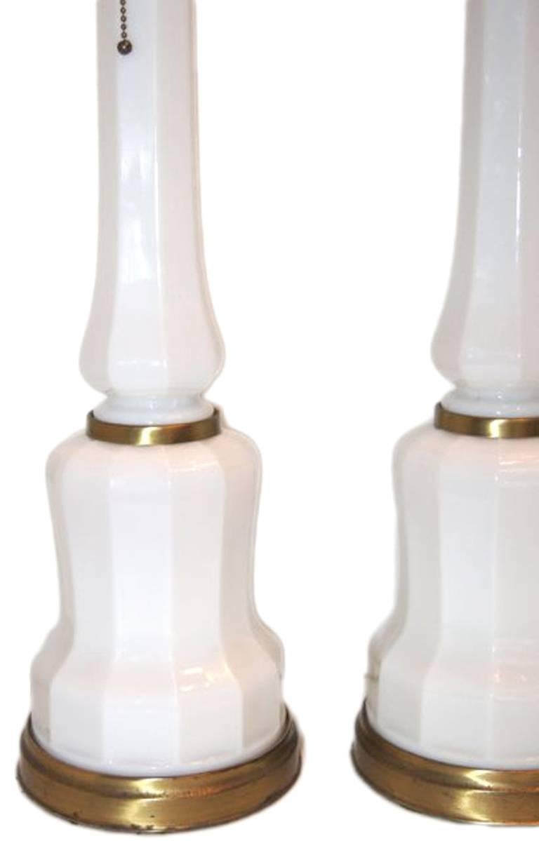 Pair of  French, 1940s white opaline glass table lamps with gilt metal bases. Neoclassic style.

Measurements:
20.5