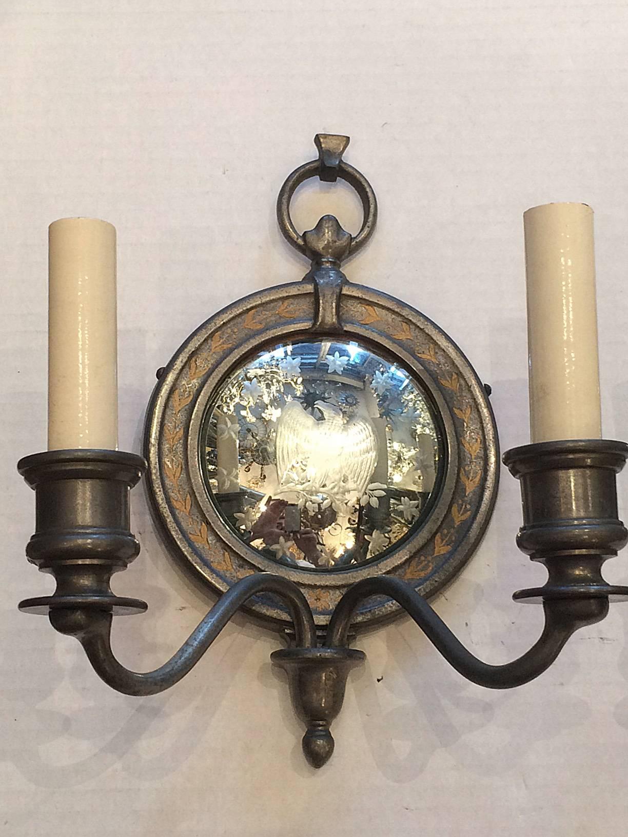 Pair of circa 1920’s American Empire-style sconces with eagles etched on mirror backplates.

Measurements:
Height: 10?
Depth: 6.5?
Width: 8?.