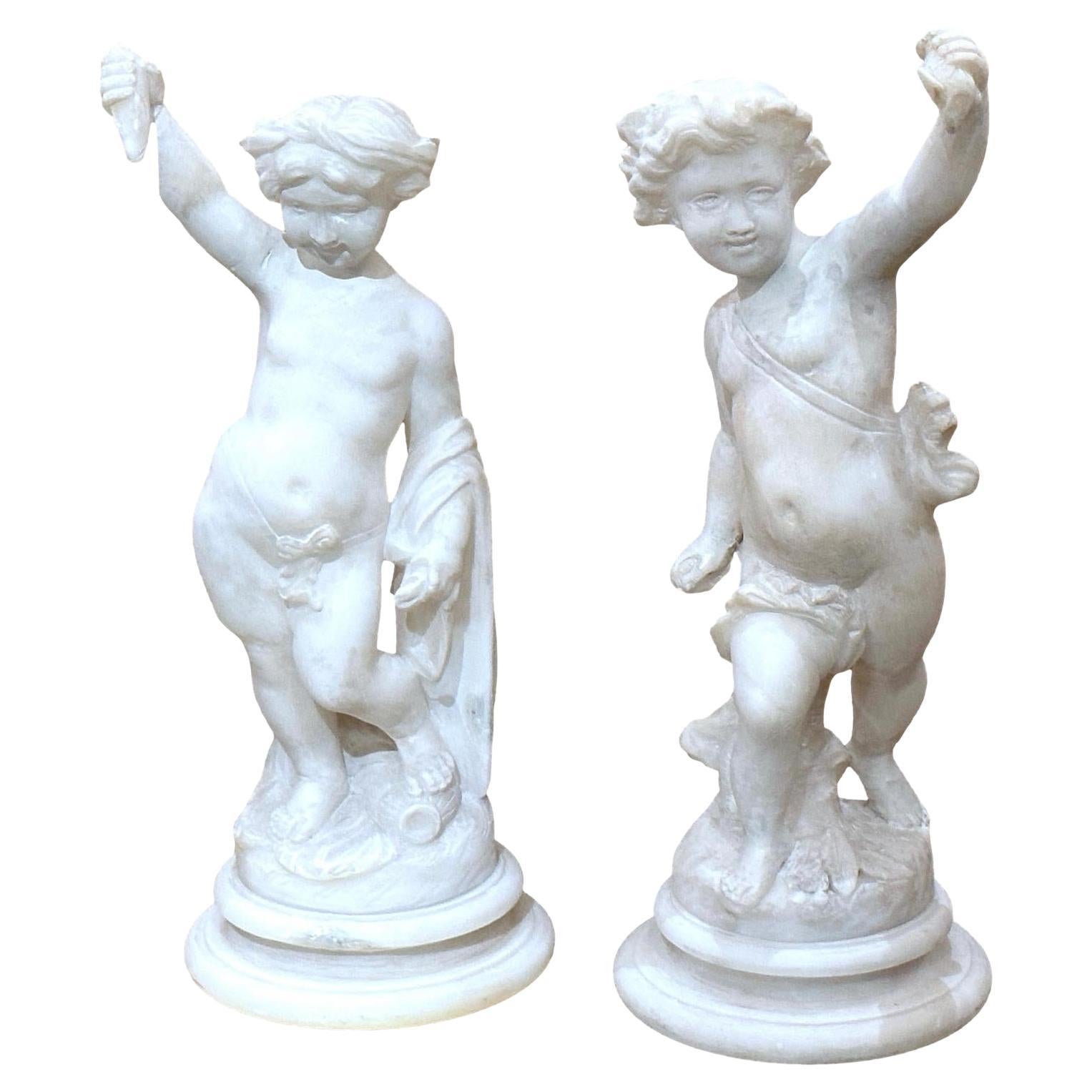 Pair of Carved Alabaster Putti For Sale