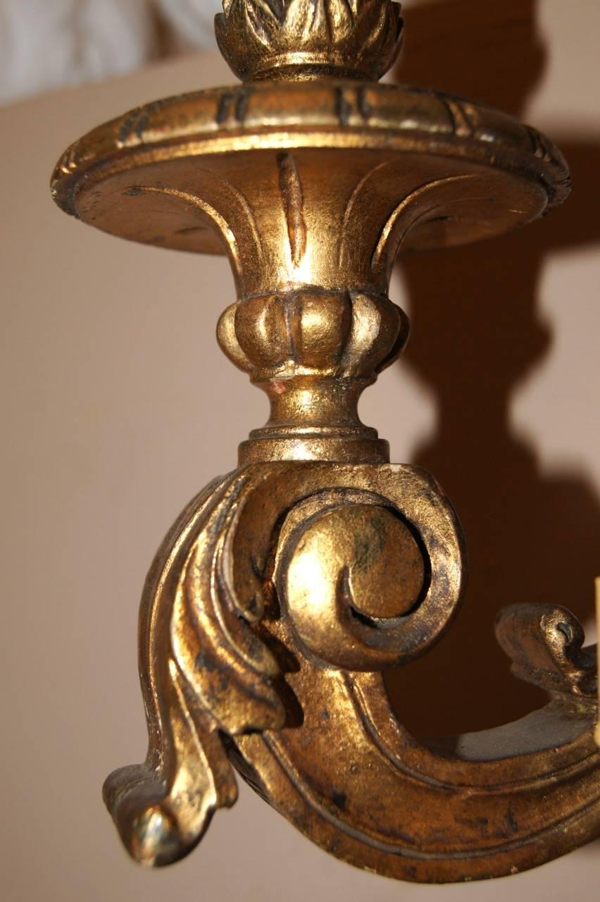 Carved Pair of Gilt Wood Sconces For Sale