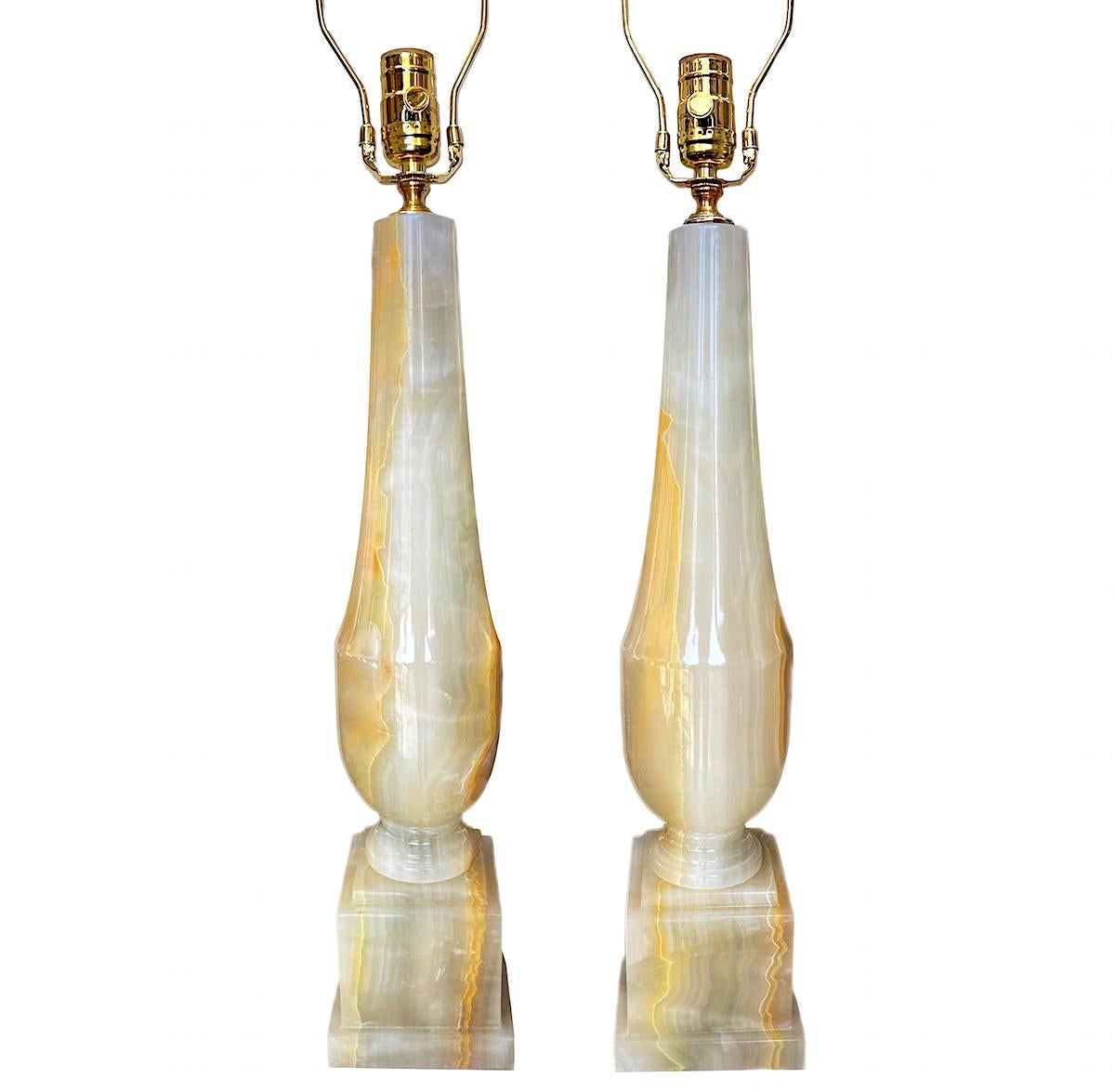 Pair of circa 1920s Italian onyx column lamps.

Measurements:
Height of body: 19