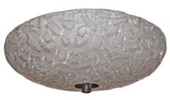 Luminaire en verre moulé