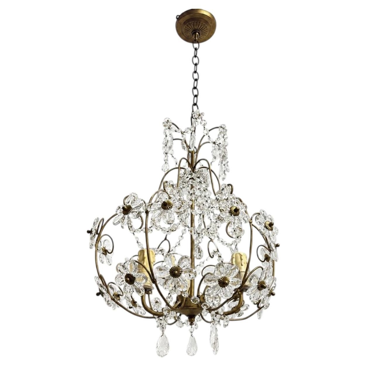Lámpara francesa de metal dorado con flores