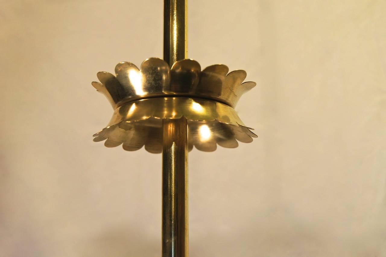 Italian, circa 1960s gilt metal light fixture with glass flower cups and sixteen-lights.

Measurements:
Drop (current): 28