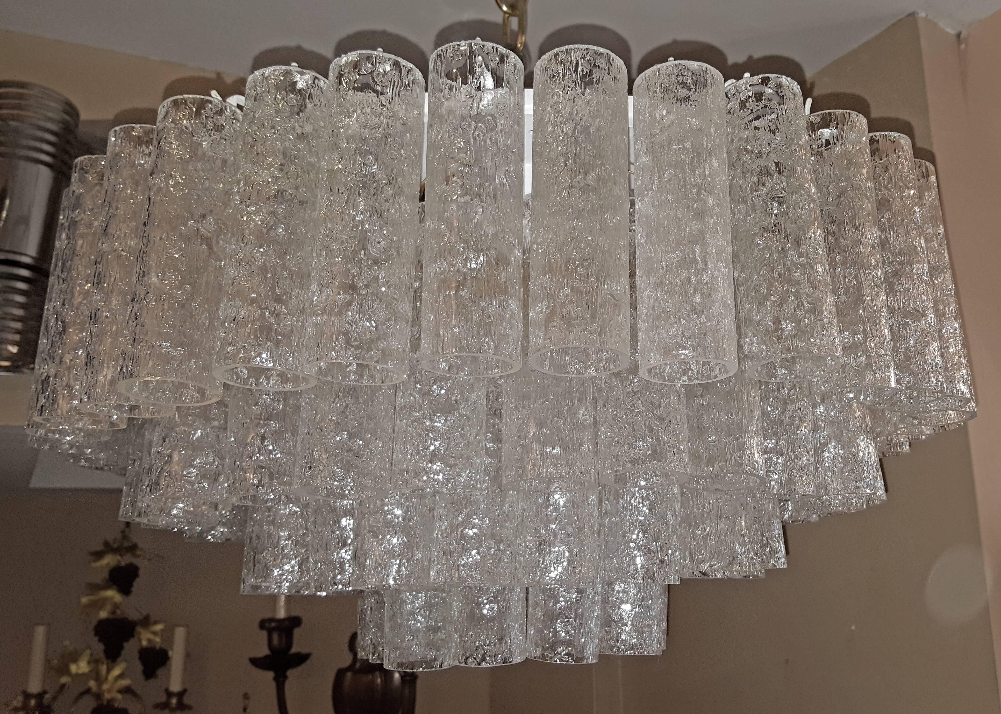 A 1960s Italian glass light fixture, with nine candelabra interior lights.

Measurements:
Height: 11