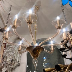 Par de grandes lámparas de araña de cristal de Murano de color ámbar claro. Se venden por unidad