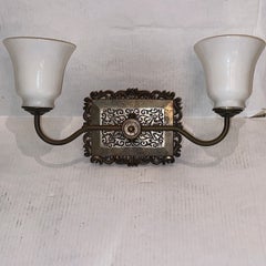 A Single Milk Glass Horizontal Sconce