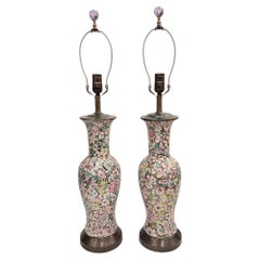 Coppia di lampade vintage con motivi floreali smaltati