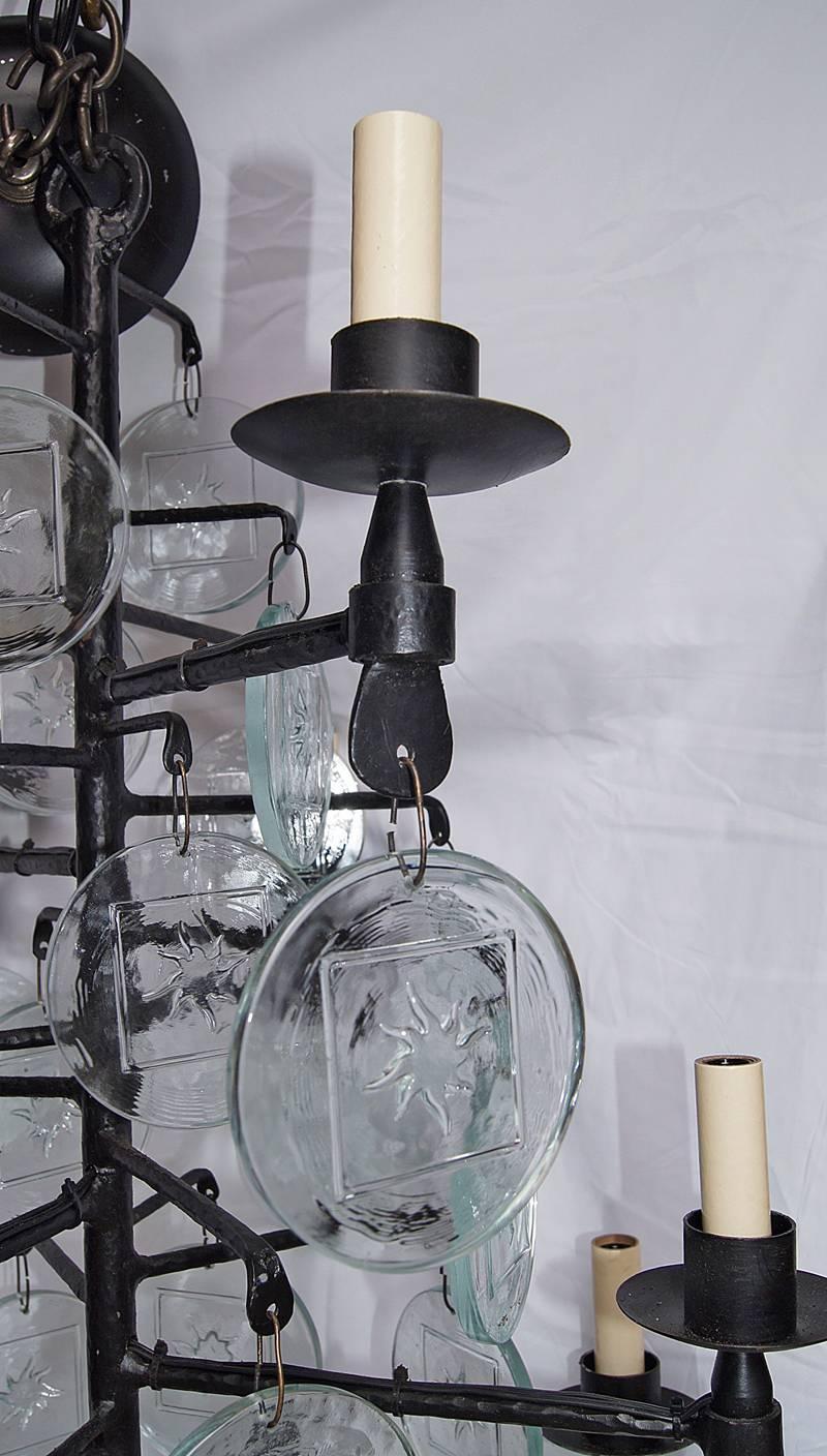 Mid-20th Century Pair of Wrought Iron and Molded Glass Chandeliers. Sold Individually.