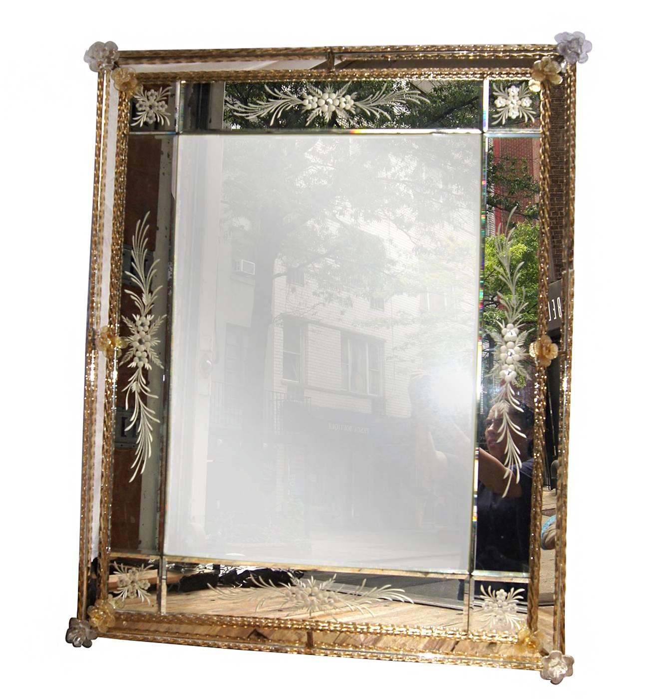 Venetian etched mirror with twirled glass along the frame and handblown flowers, circa 1930s.

Measurements:
Height: 40
