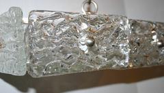 Pair of Molded Glass Light Fixtures. Sold individually