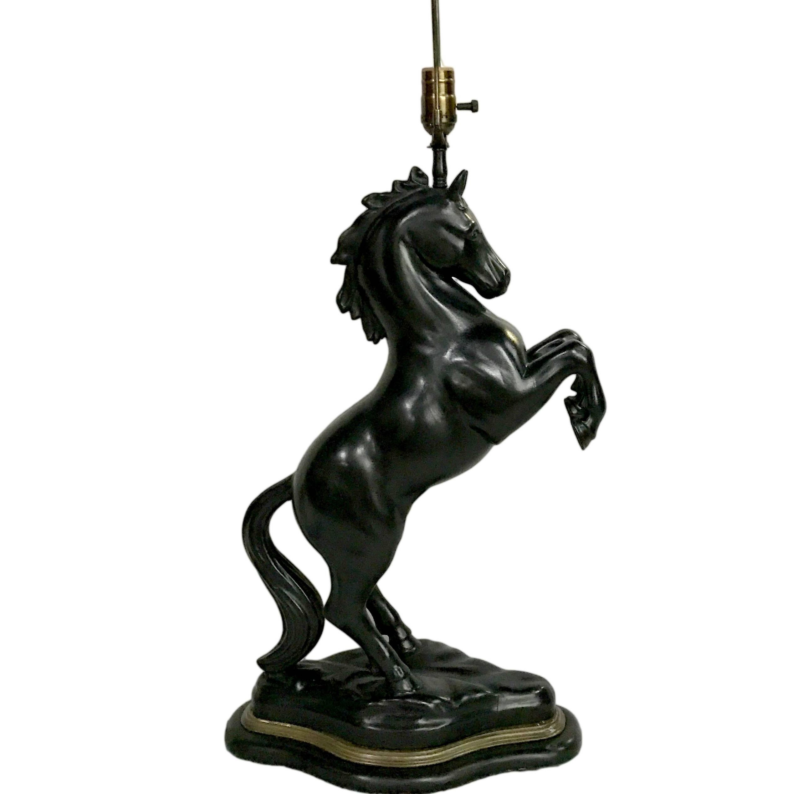Carved wood horse shaped lamp, painted finish, circa 1910

Measurements:
26