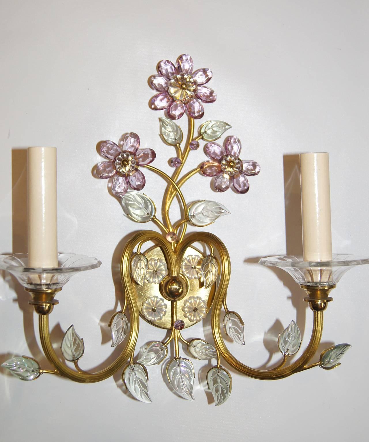 Pair of French 1920's gilt sconces with amethyst crystal flowers and molded glass leaves.

Measurements:
Height: 12