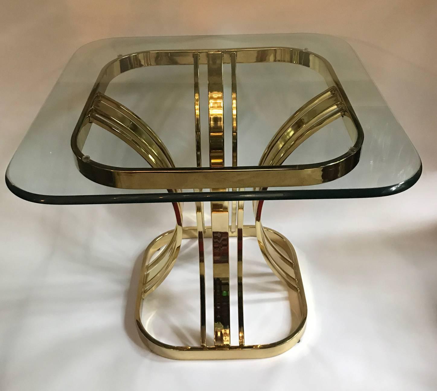 Pair of Moderne style 1960's Italian side tables with glass tops.

Measurements:
Height: 23.5