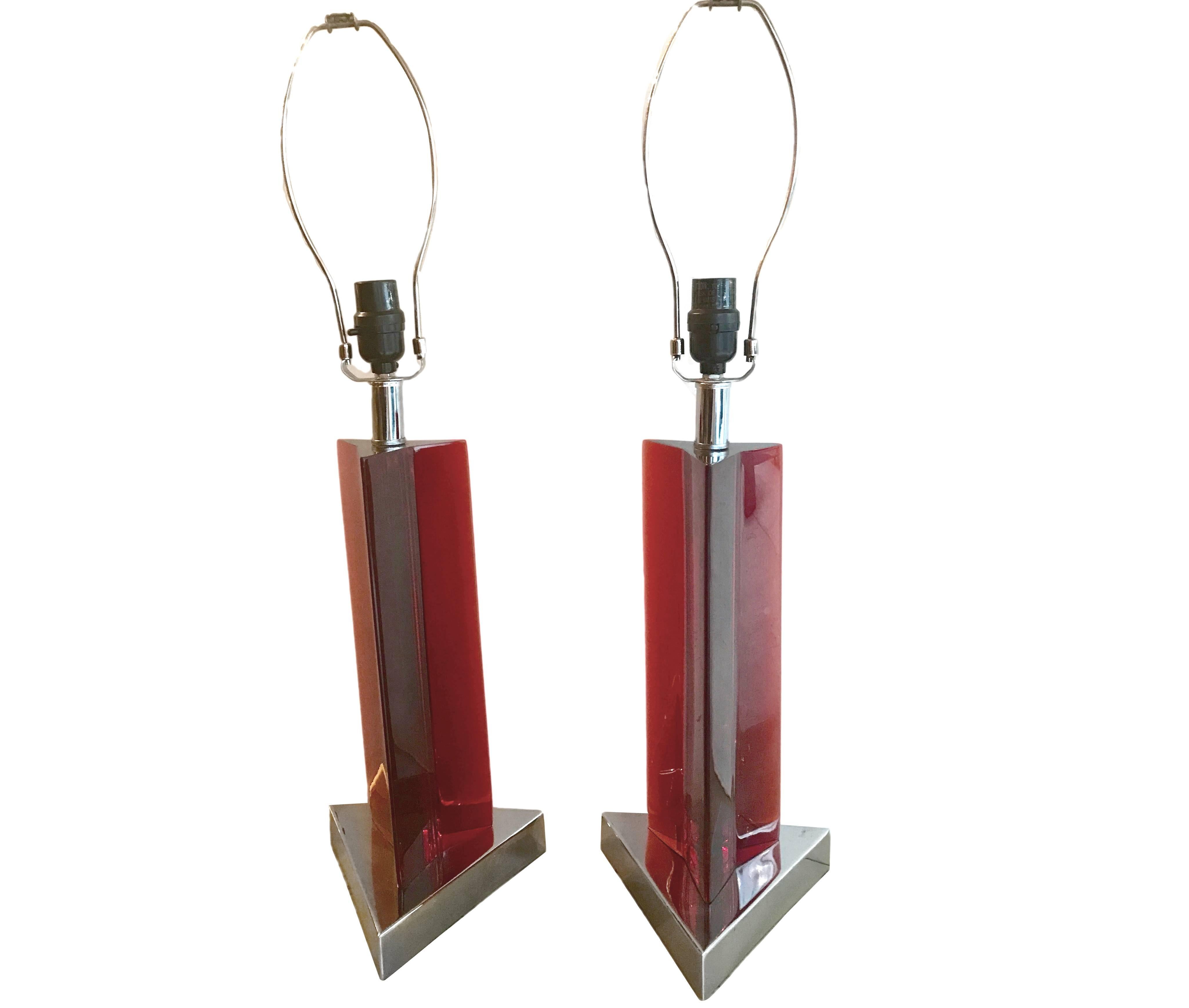 A pair of circa 1960s triangular shape Italian red Lucite table lamps.

Measurements:
Height of body: 14