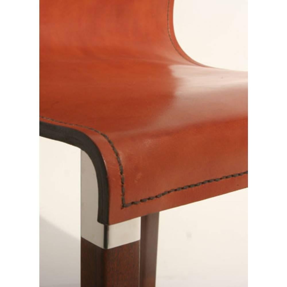 This listing is for one Zele Company Emile Counter Height stool. Leather staining color is as pictured.
We have four of these stools available (sold separately) that were showroom models and are in great shape. These have been on display in our