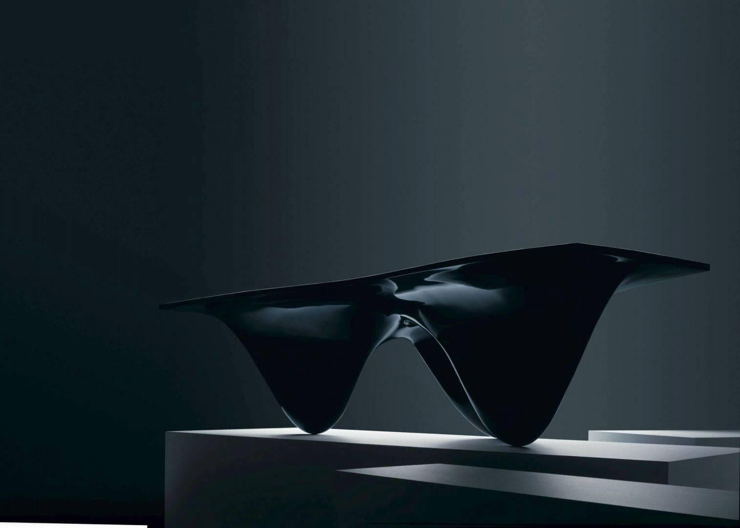 Zaha Hadid design icon inspired by the movement and fluidity of water. Available in black or white, matte or glossy finish.

Limited edition of 39 available

Fibreglass Table
2005

Pioneering architectural software was used by Zaha Hadid to sculpt