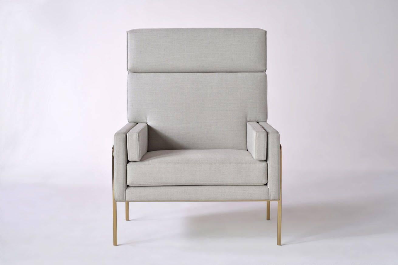 Akin to a tailored three-piece suit, the Trolley Lounge chair’s upholstered pieces are nestled in a determined, yet elegant frame. 
Pricing is for smoked brass or burnt copper frame. Please inquire for polished chrome or powder-coat frame