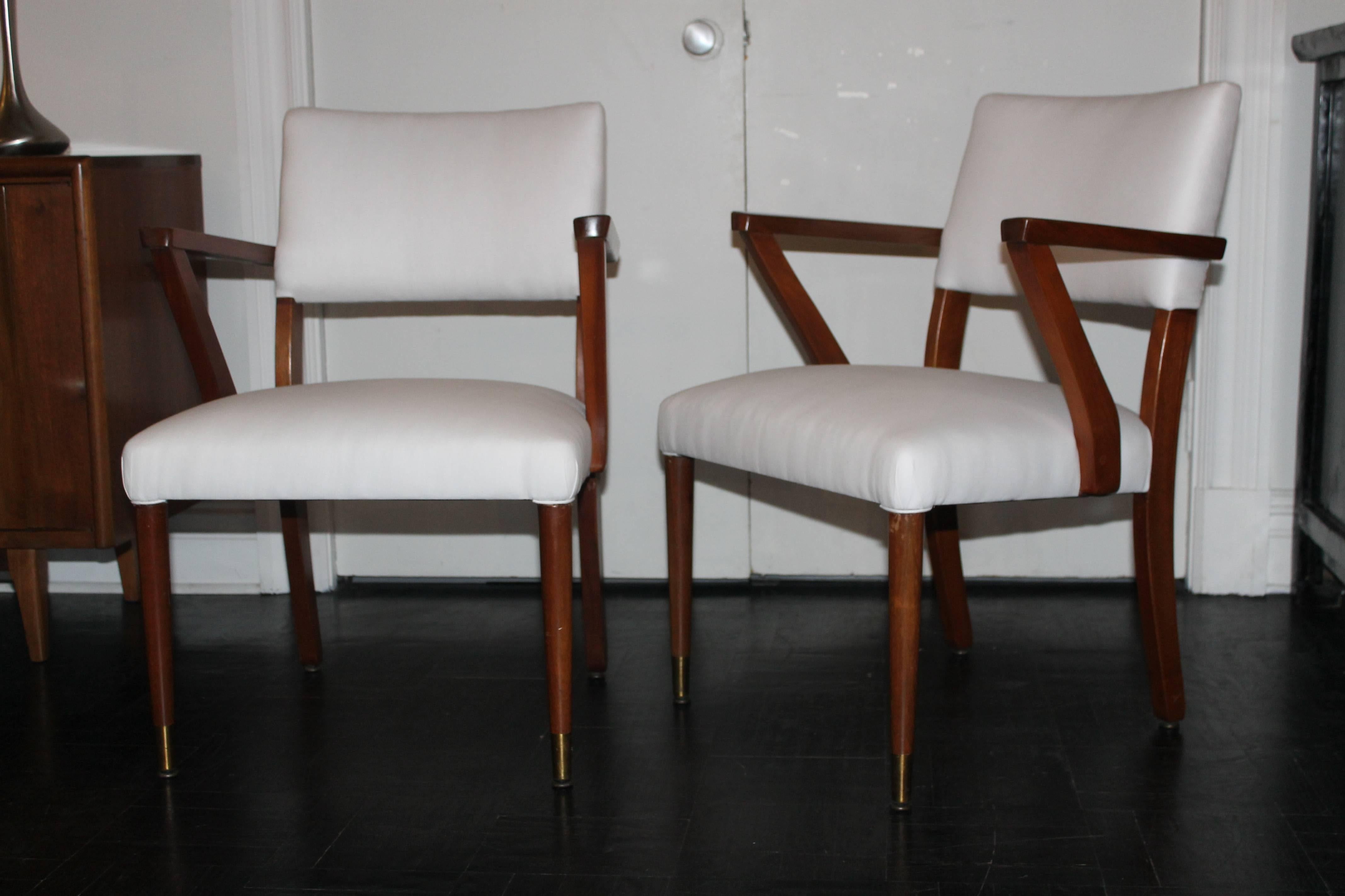 Pair of Mid-Century walnut open armchairs, in the style of Jansen.