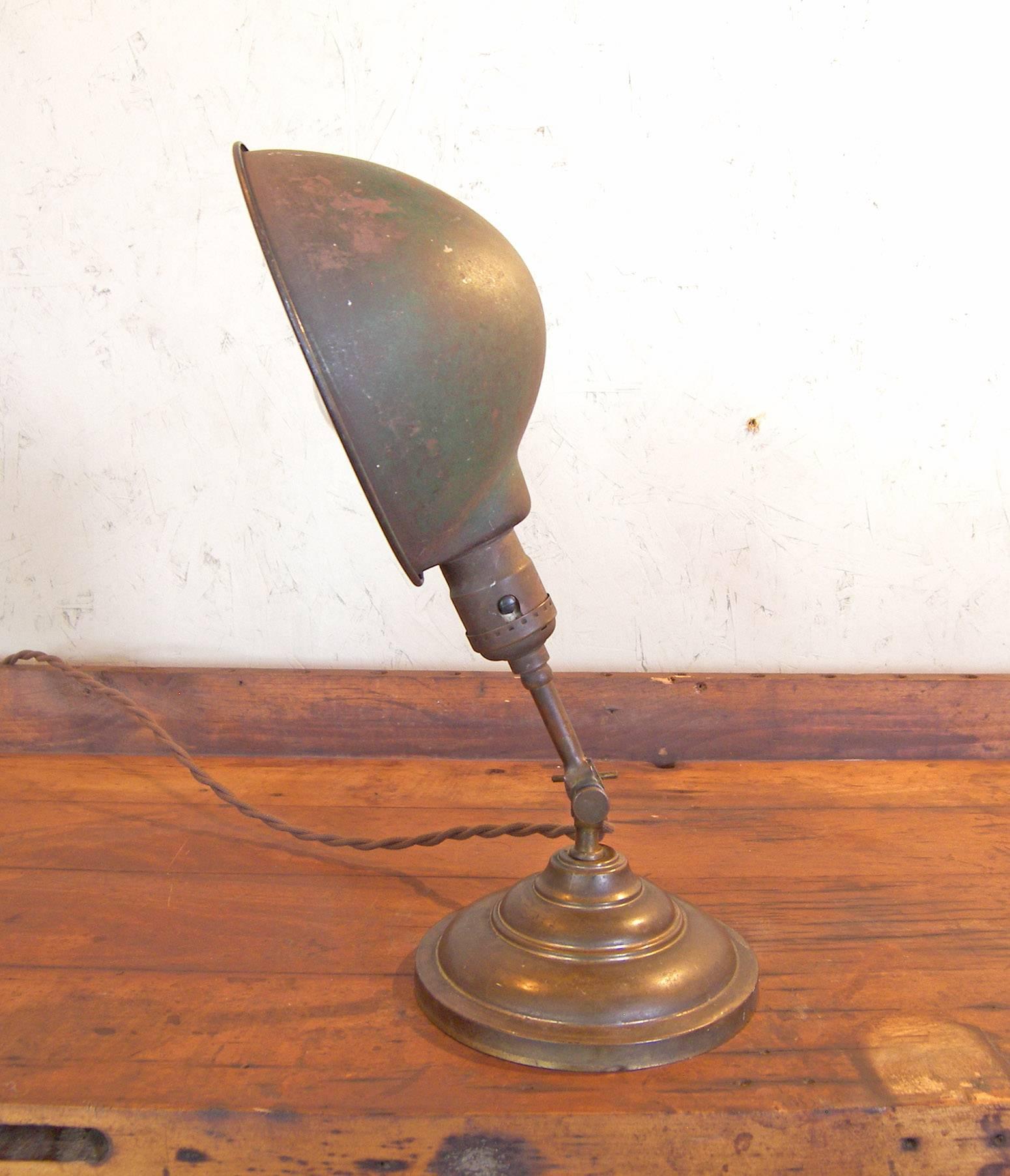 Antique vintage Industrial adjustable metal and brass desk, table lamp or light.