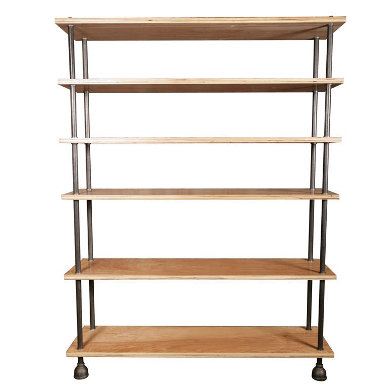Industrial hand-finished plywood, steel and cast iron shelving / storage / bookcase unit is hand-built in our Connecticut workshop using all American parts. Adjustable feet for leveling. Can be made to your specifications and with different