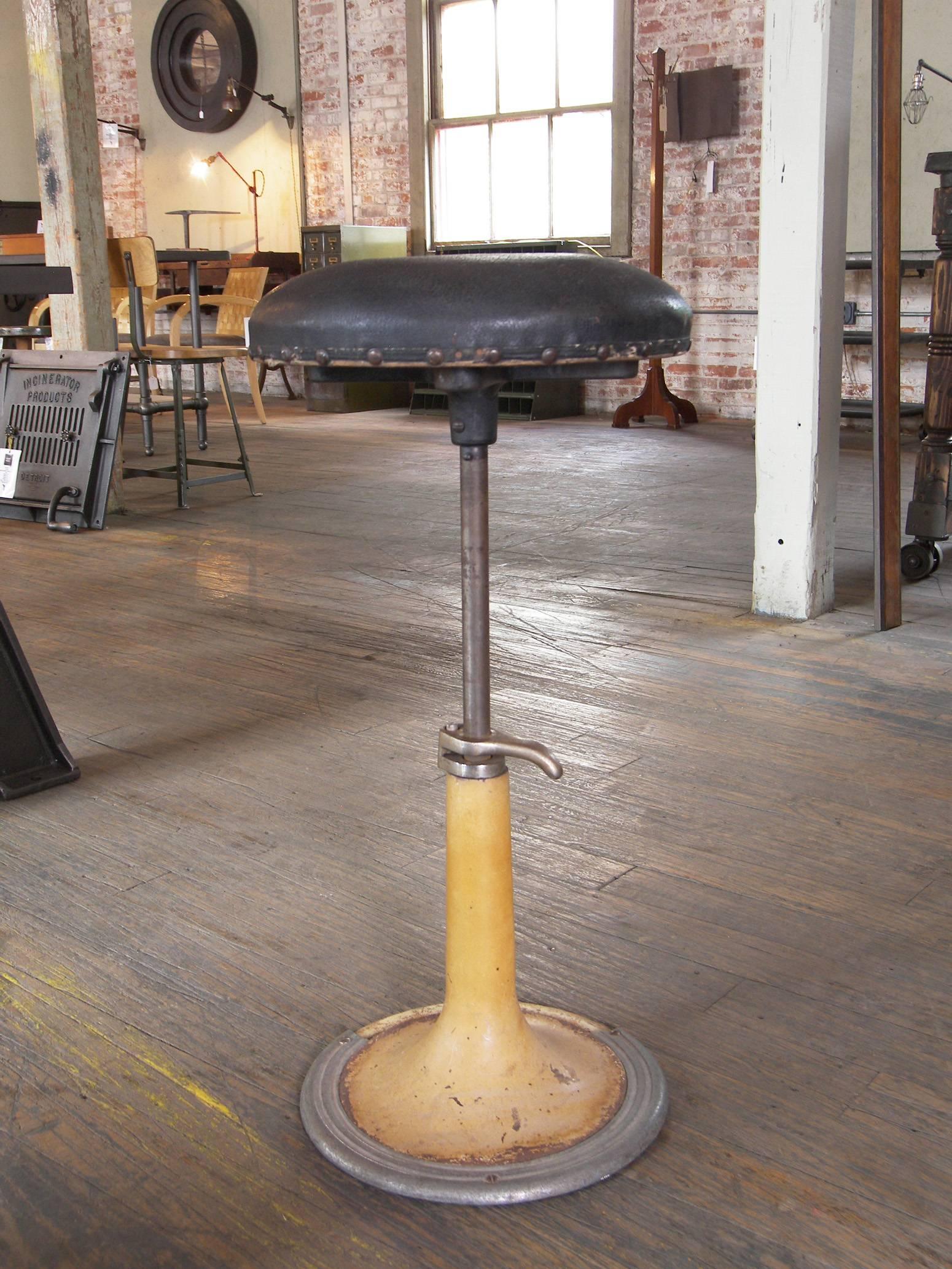Vintage Industrial retro aluminum, cast iron and leather adjustable stool. Seat is 13