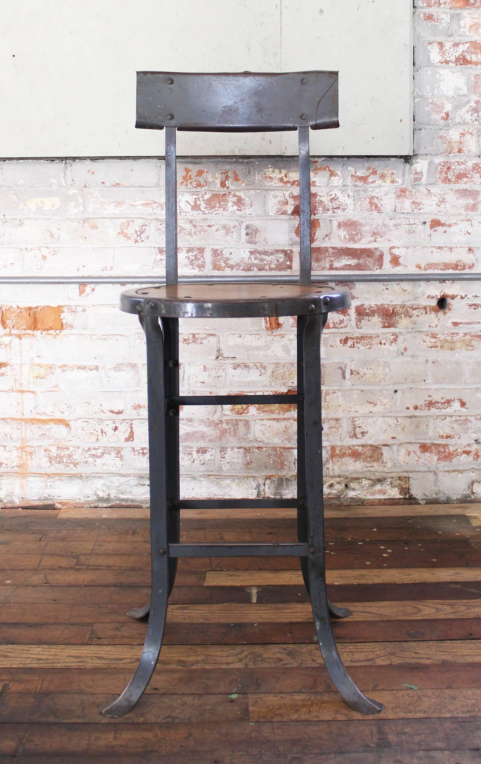 Vintage Industrial rustic wood and metal bar, kitchen island stool with back and footrest. Measures: 38
