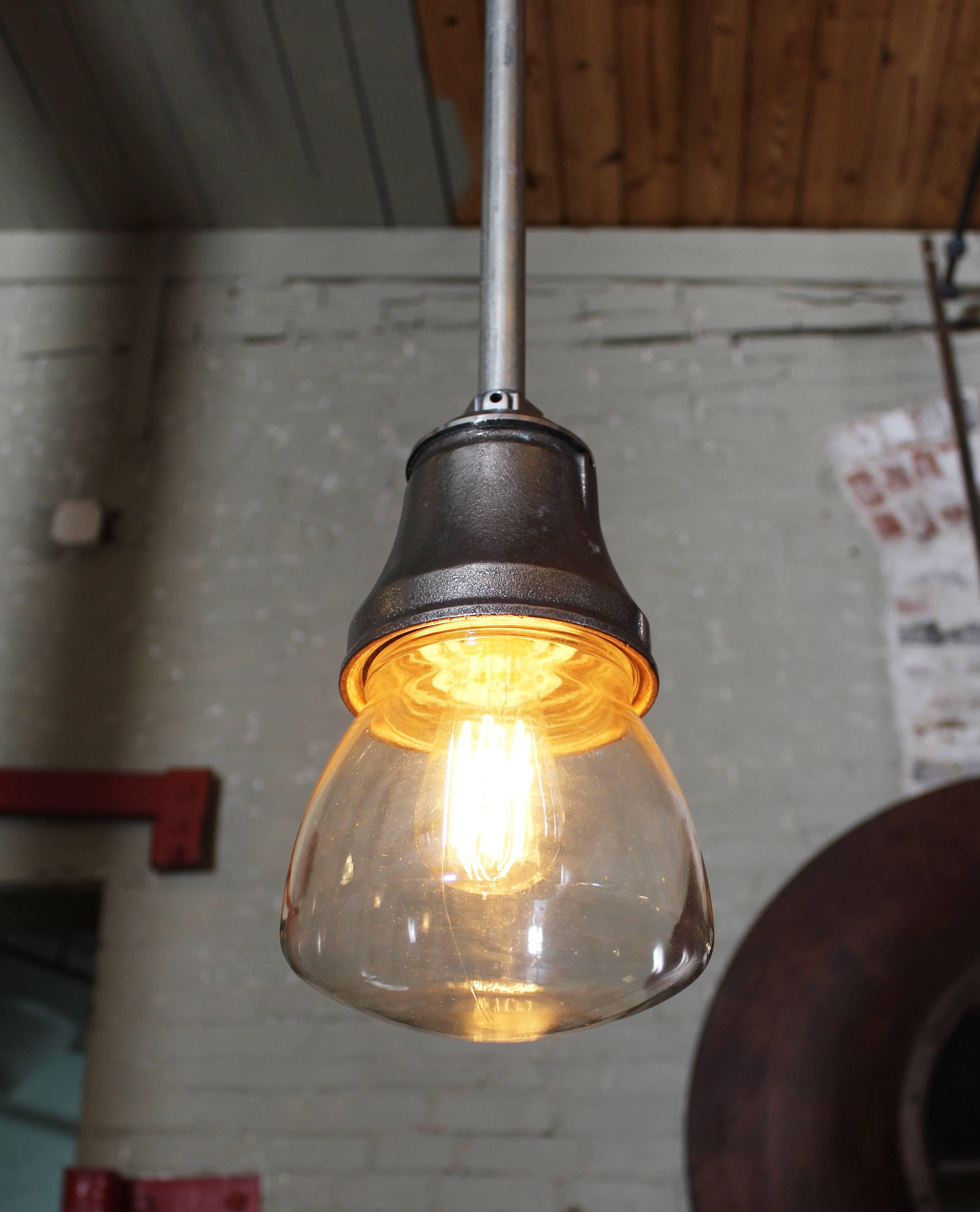 Cast Iron, glass and steel Industrial vintage ceiling, hanging lamp, light. Steel pole supplied and cut to your specs. The glass measures 6 1/4