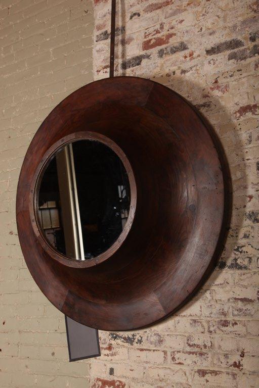 Original, vintage industrial, American made, foundry wall mirror. Mirror diameter is 22 ½". Overall diameter is 50" depth.