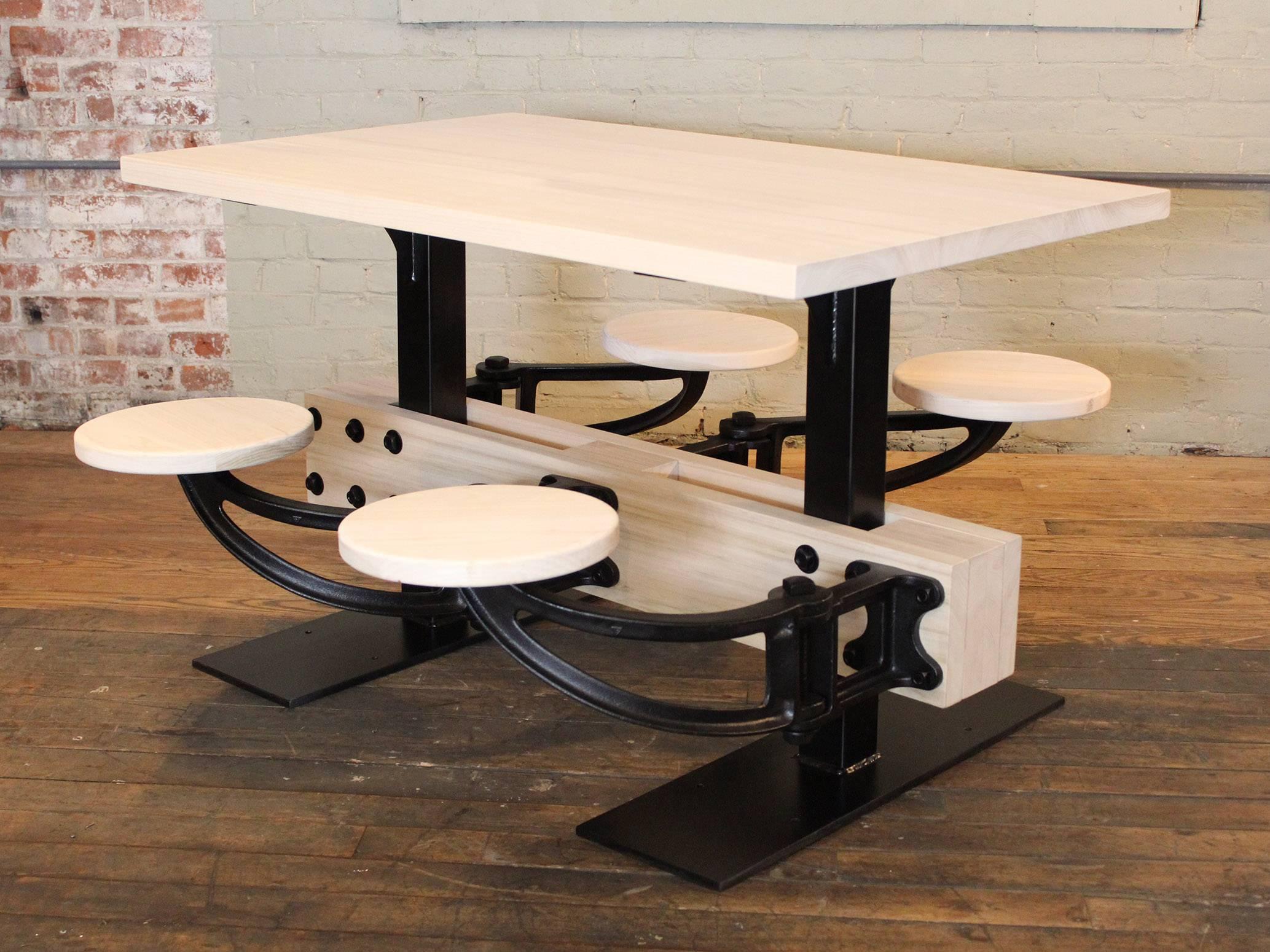 round table with attached stools