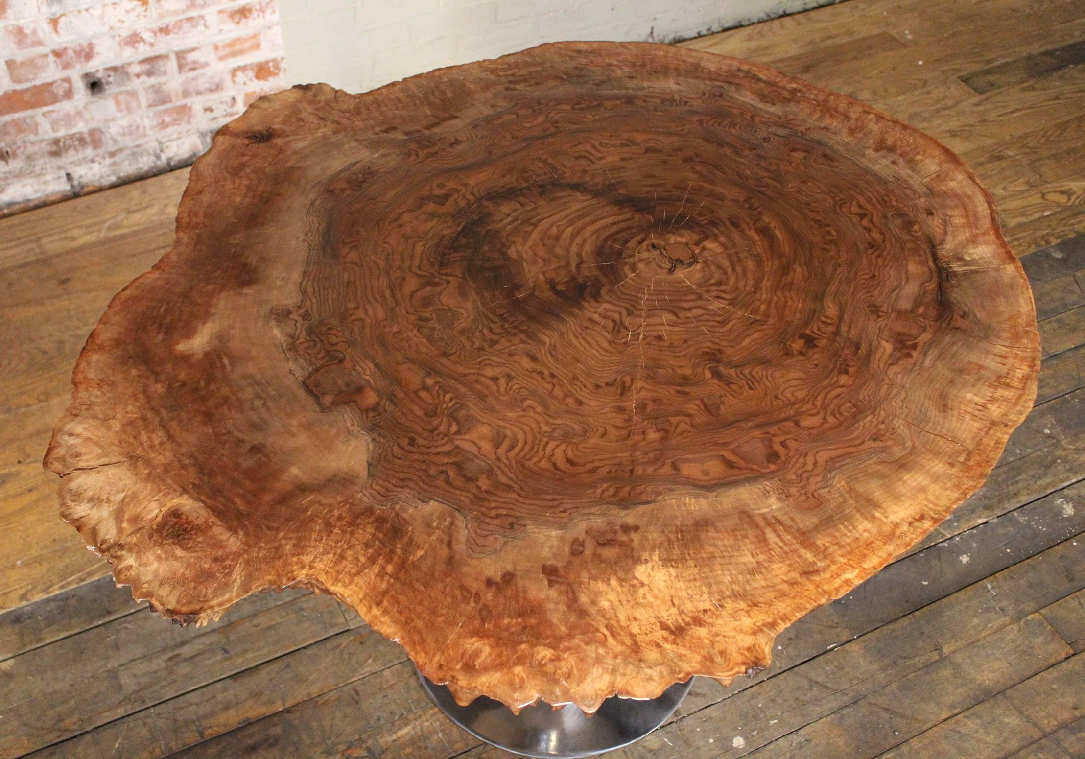 Mid-Century Modern burl walnut free-form live edge wooden top on a vintage polished aluminum tulip dining table base. Measures: 46