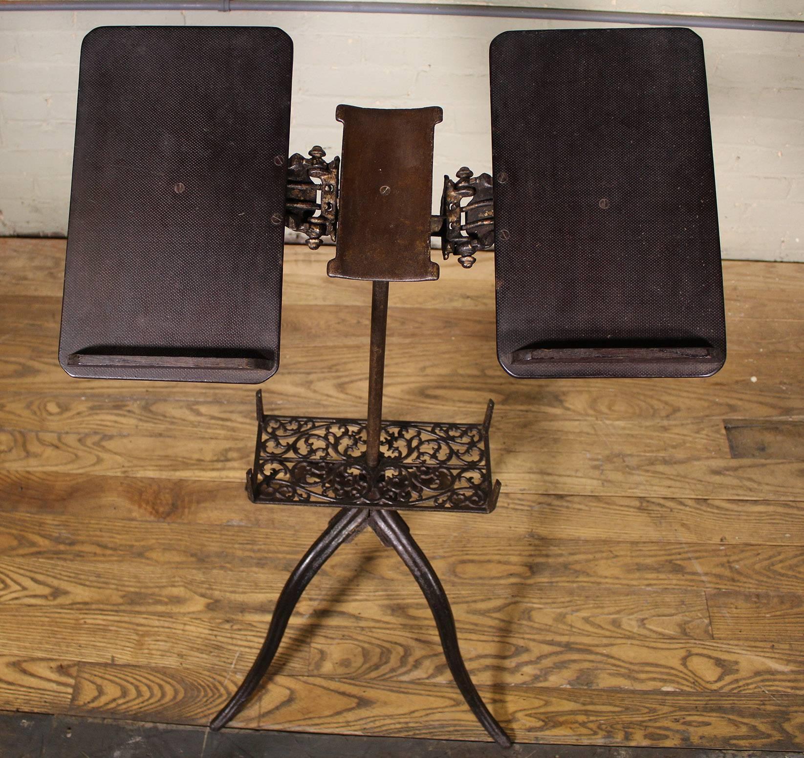 antique cast iron book stand