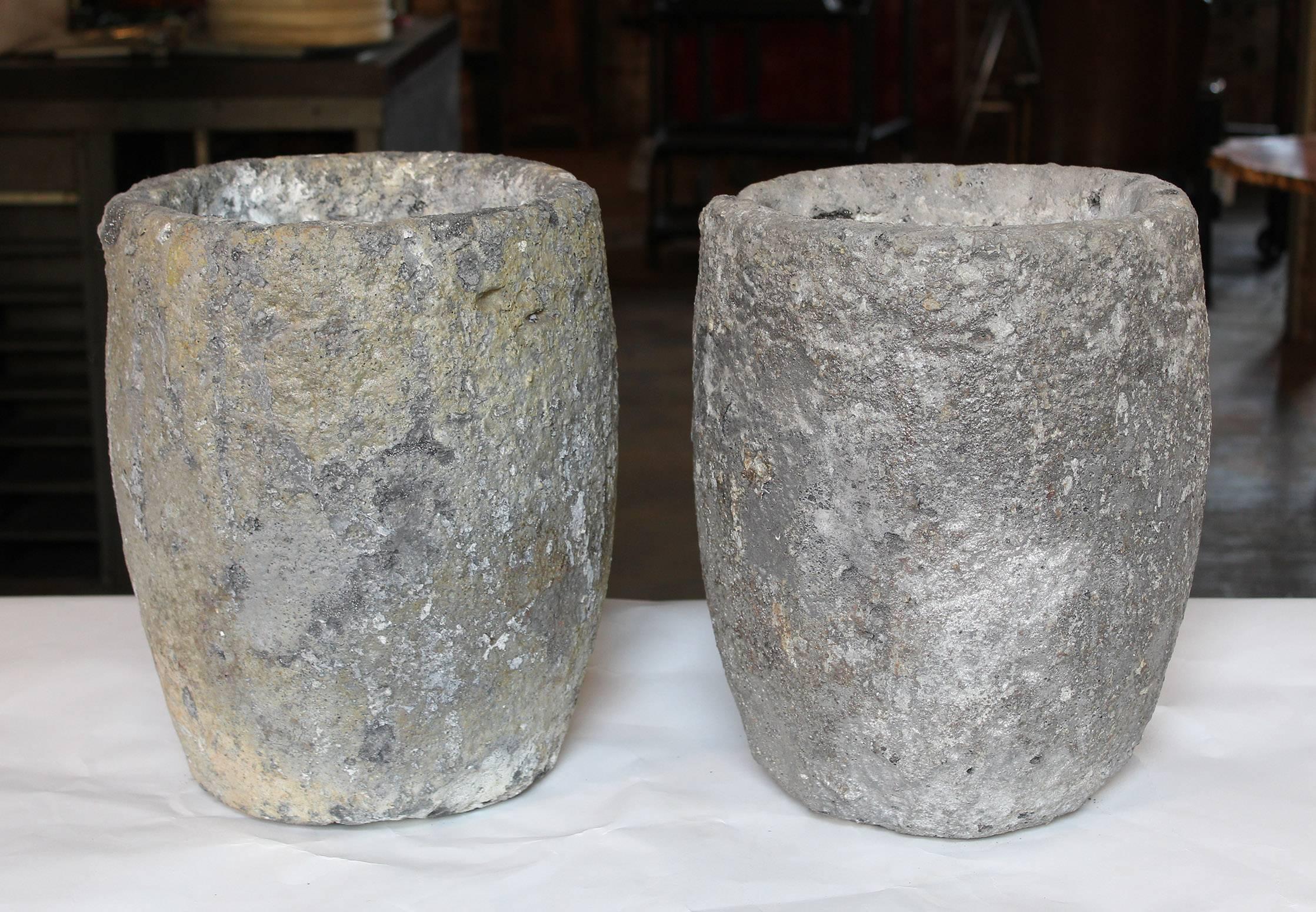 Pair of vintage foundry ceramic foundry crucibles planters, architectural. Measure: 14" tall, 11" in diameter.