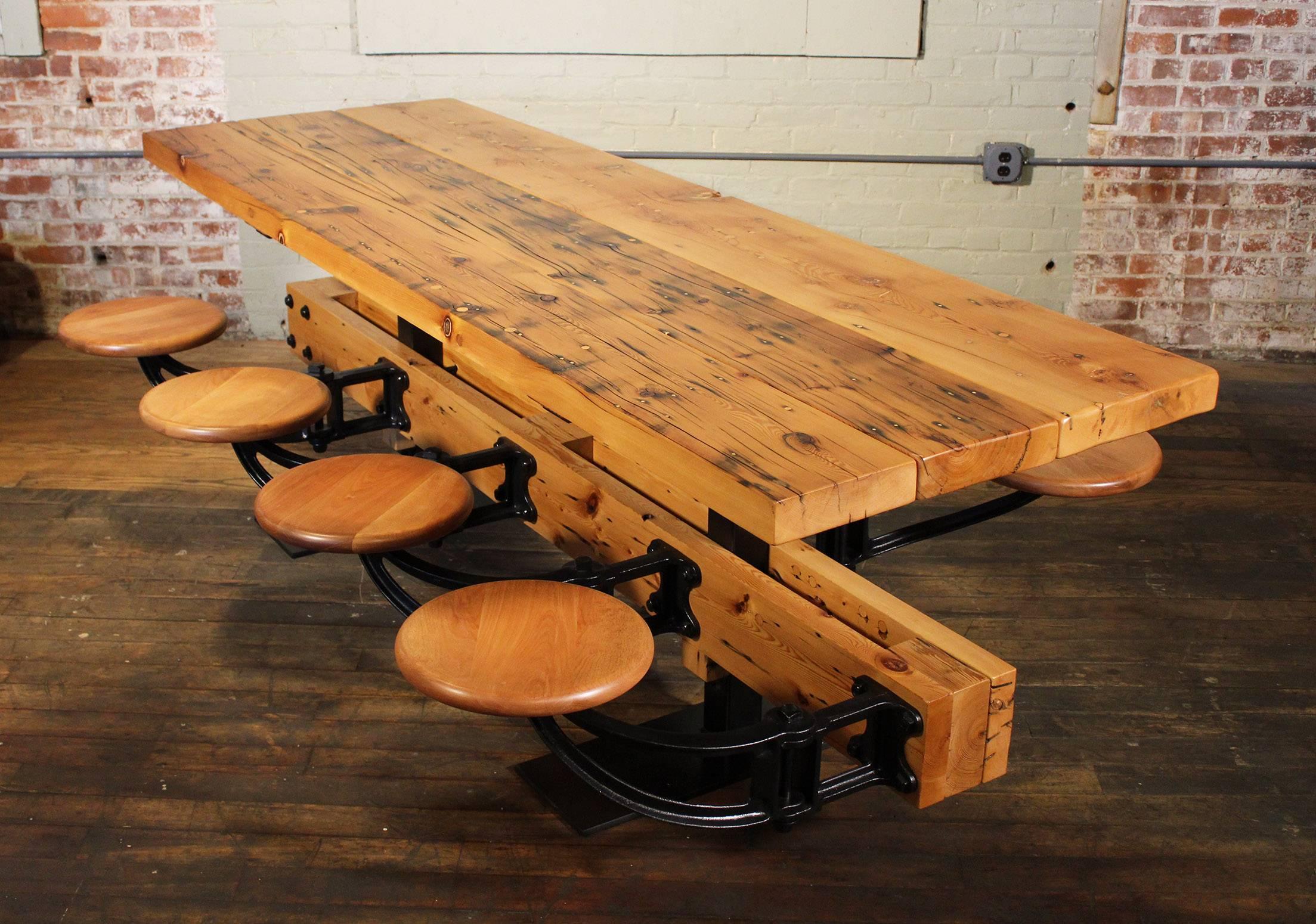 Reclaimed wood and cast Iron eight-seat dining table with seats, chairs, indoor picnic, breakfast, kitchen. Measures: 96
