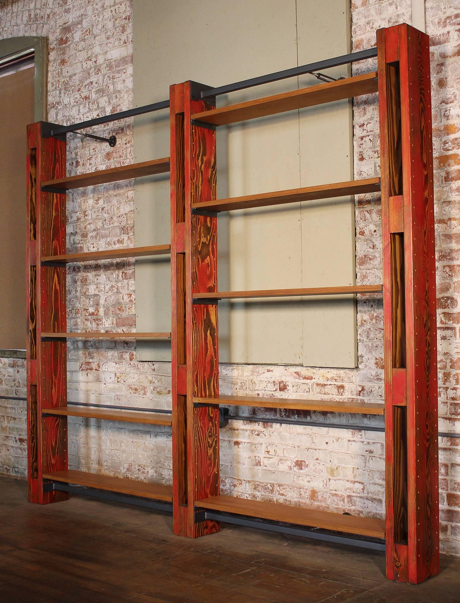 Custom modular shelving storage bookcase system by Get Back Inc. In the vintage Industrial style. System as shown includes ten 8″ shelves, three beams, two top mounting bars, two bottom mounting bars, six adjustable wall mounting brackets, and ten