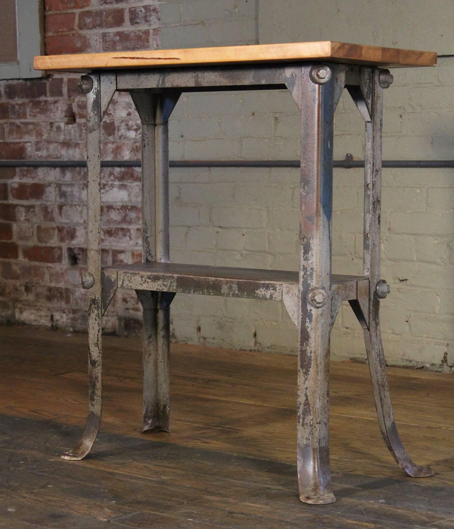 Vintage Industrial distressed two-tier wood and metal side table - shelf - stand. Wood top measures 28