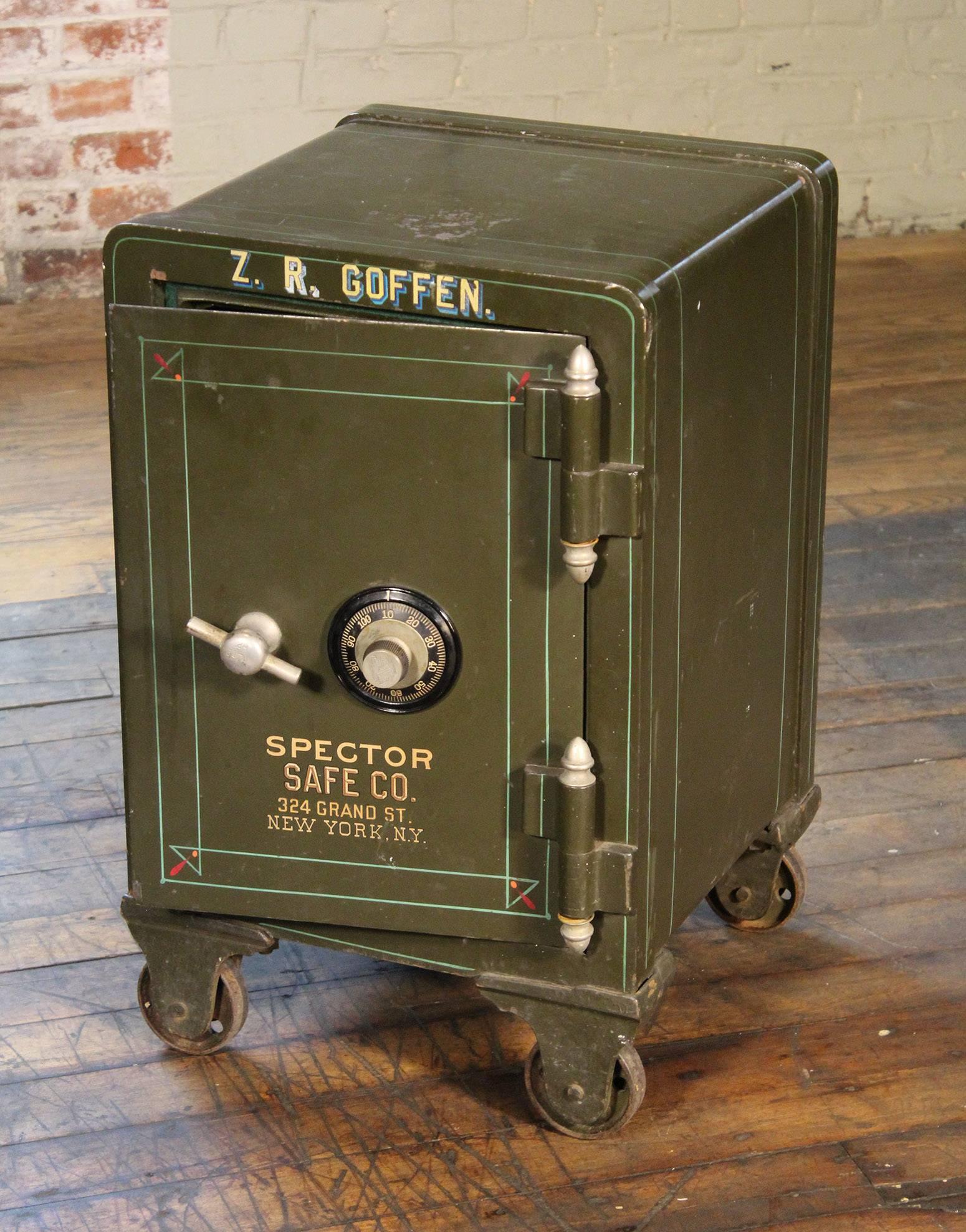 Vintage antique steel Spector safe on wheels. Reads "Z. R. Goffen." "Spector safe co 324 grand St. New York N.Y.".